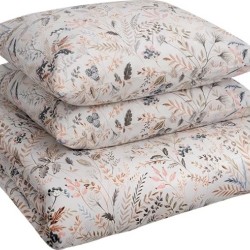 Heledal põhjal tiheda peene paimemustriga puuvillsatäänist voodipesukomplekt.