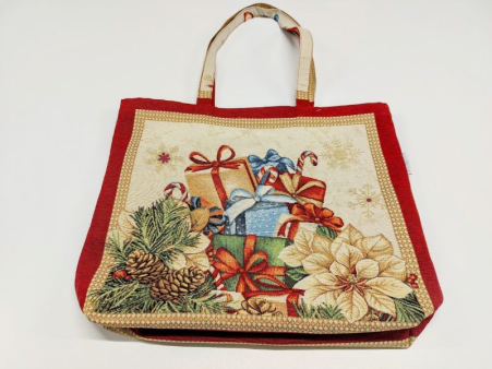 Rõõmsa jõulumustriga tugev kandekott.